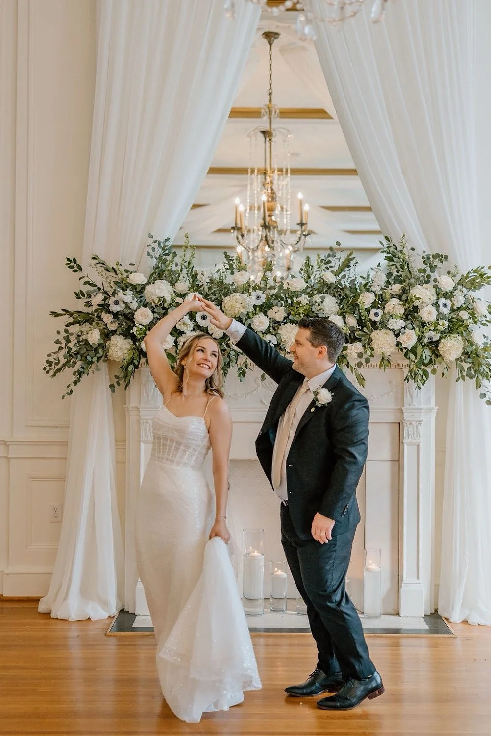 Bride and groom dance at Hotel Concord wedding venue.
