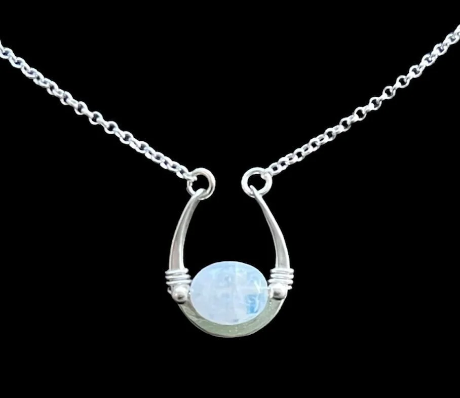 Tiny Rainbow Moonstone Healing Portal Amulet in Sterling Silver 🌙🤍🌈

👁 Moonstone is a stone of mystery. It has often been associated with the feminine because of its ability to enhance the intuitive side of the mind &amp; its connection to the mo
