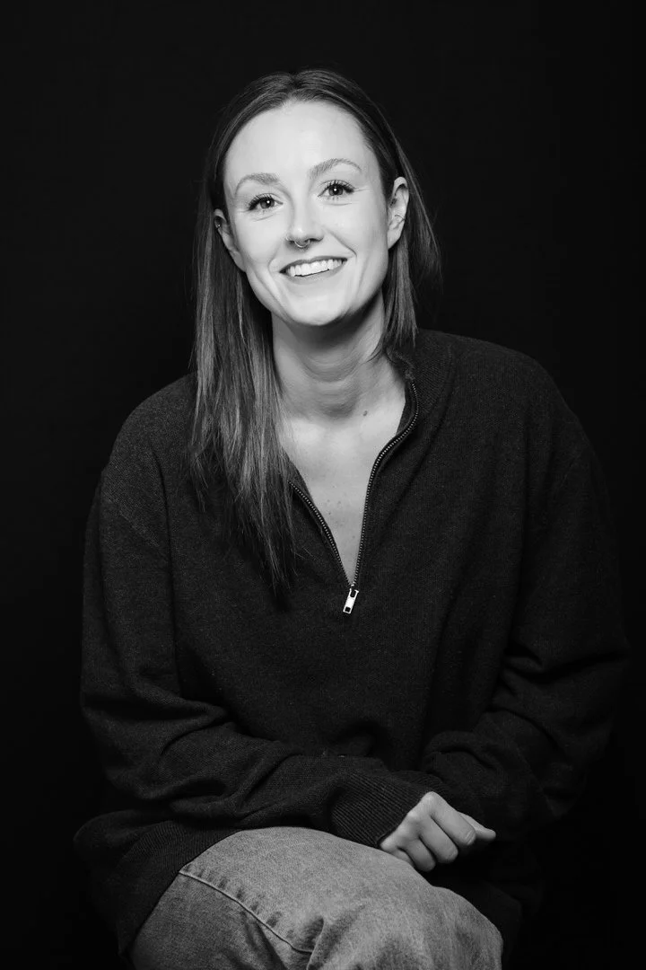 Woman poses for a black and white photo for a headshot in Portland Oregon