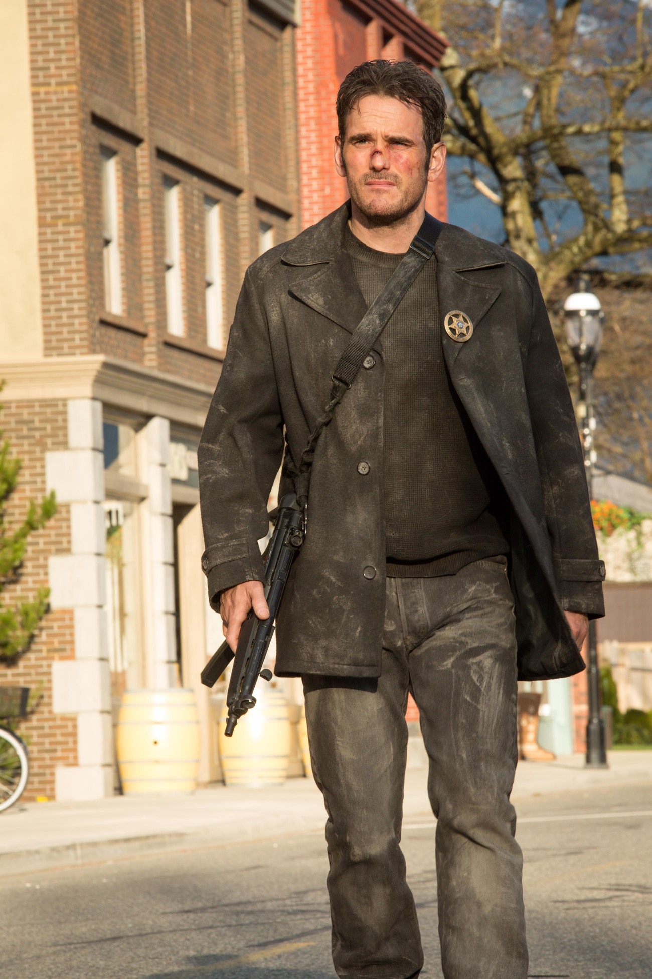 WAYWARD PINES: Ethan (Matt Dillon) patrols Main Street in the “Cycle” season finale episode of Wayward Pines