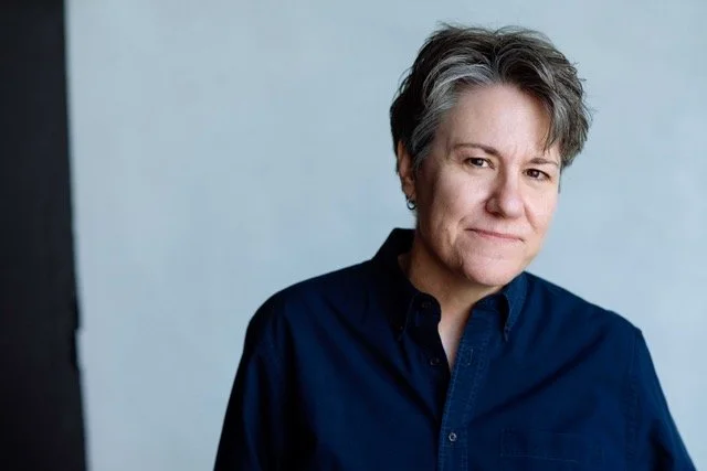 AMY E. DUDDLESTON, ACE