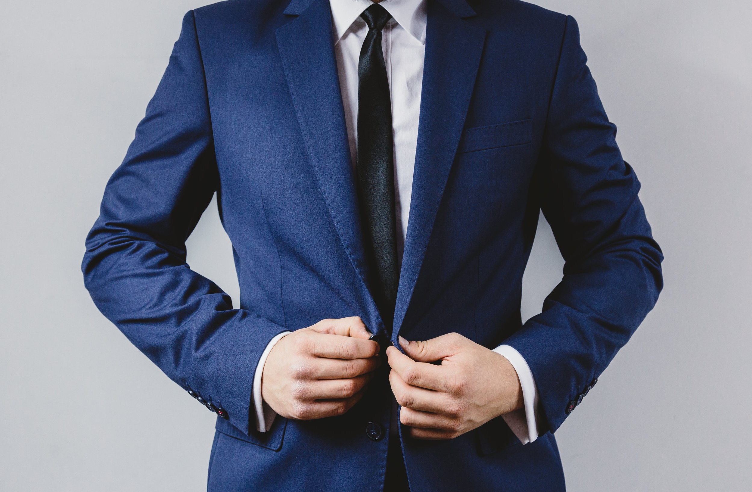 suit-navy blazer grey background.jpg