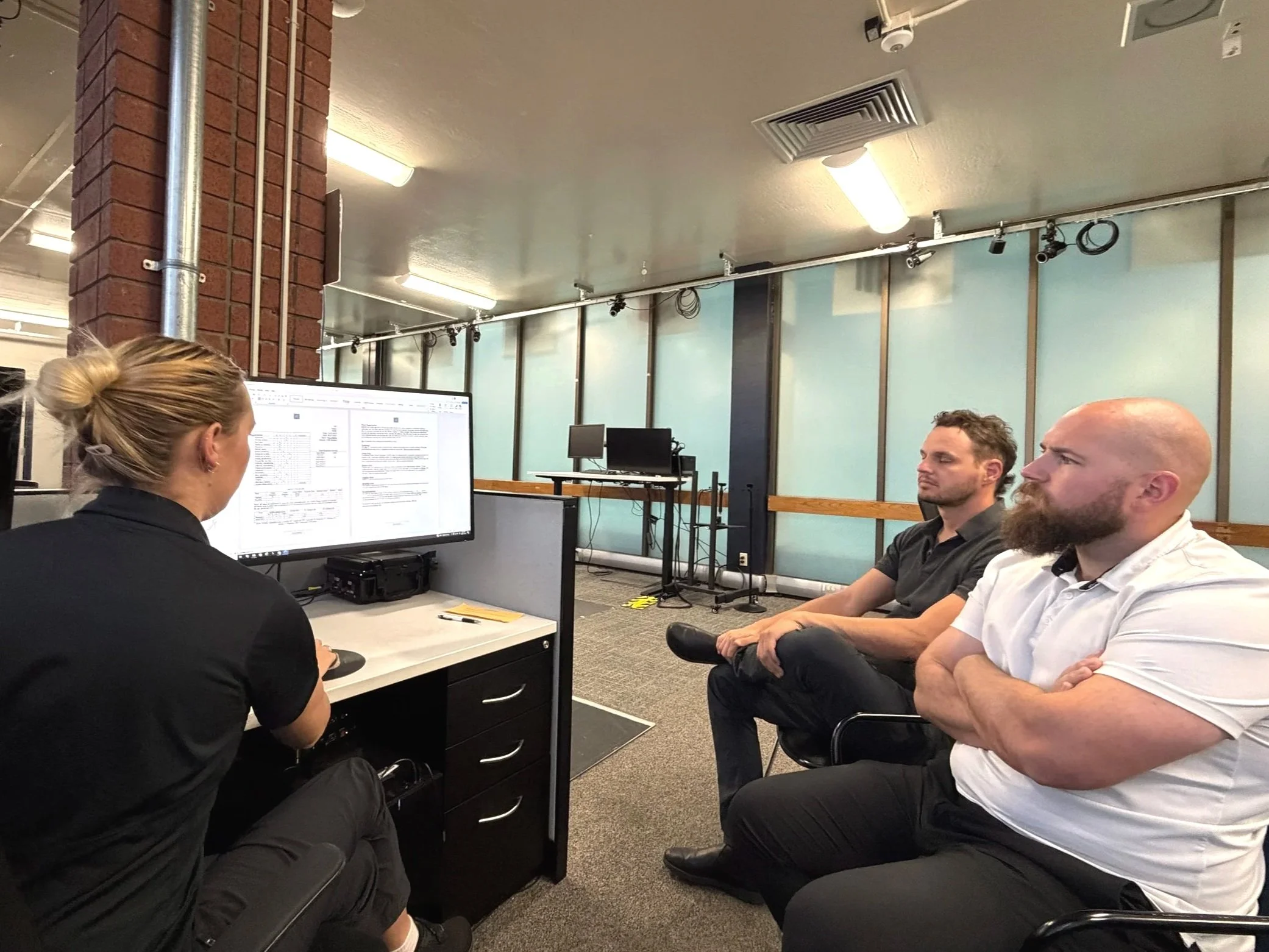 Radius Physical + Sports Rehab team collaborating with Zoe Haddox, LAT, ATC at the University of Nevada, Reno Neuromechanics Lab for advanced concussion and TBI training.