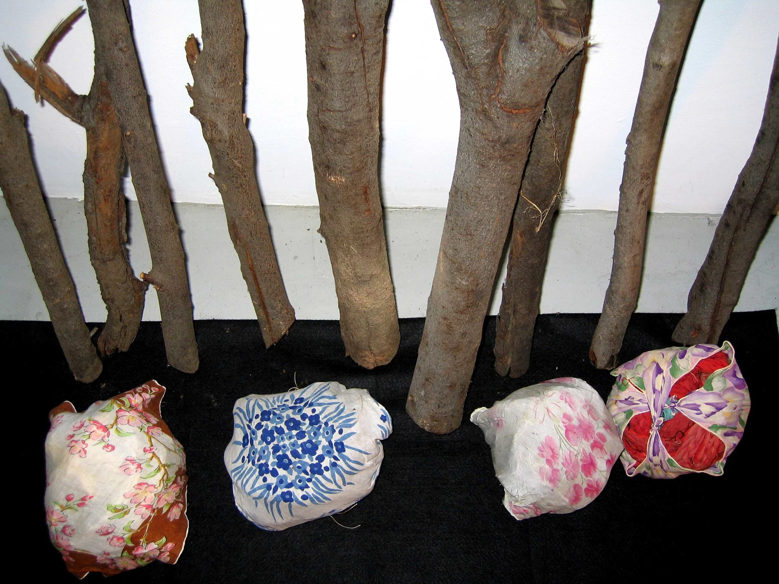 Four Balls with Tree Limbs