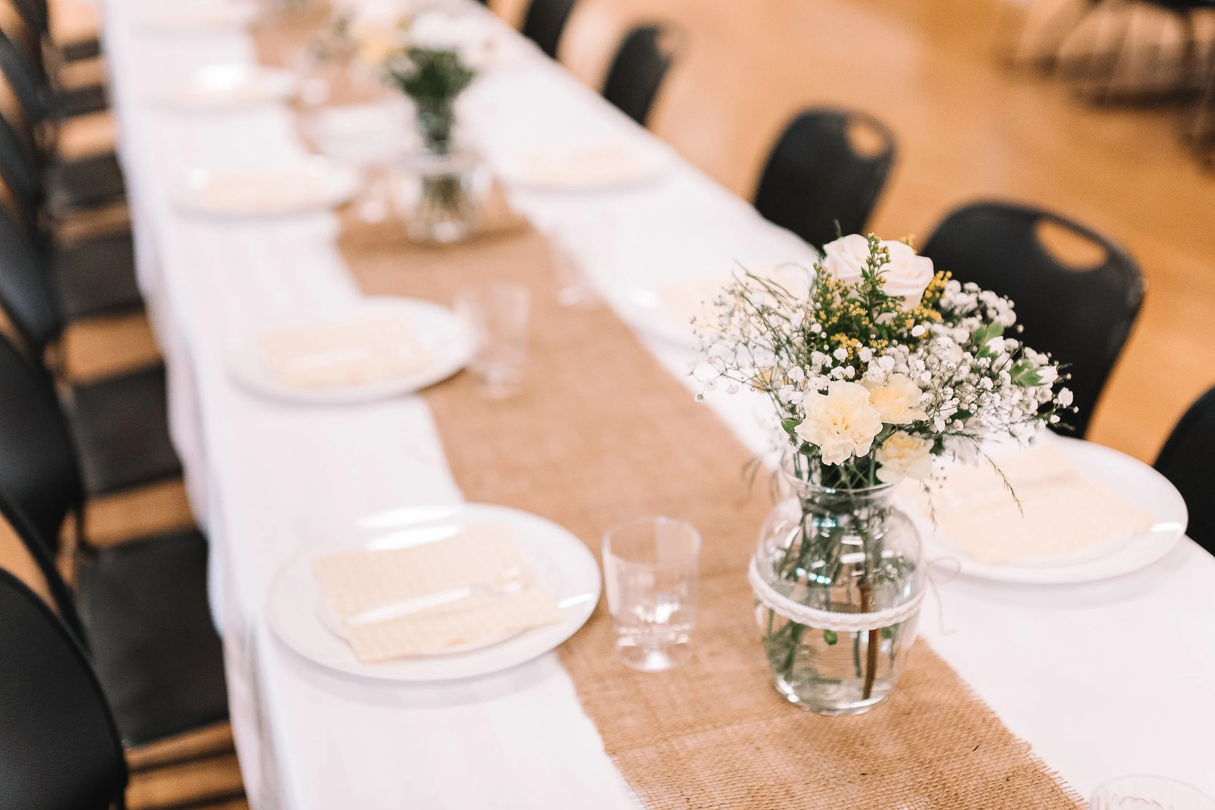 We bought both the ribbon and string separately and glued them onto the vases to complete the look of the centerpieces. I LOVE how they turned out!
