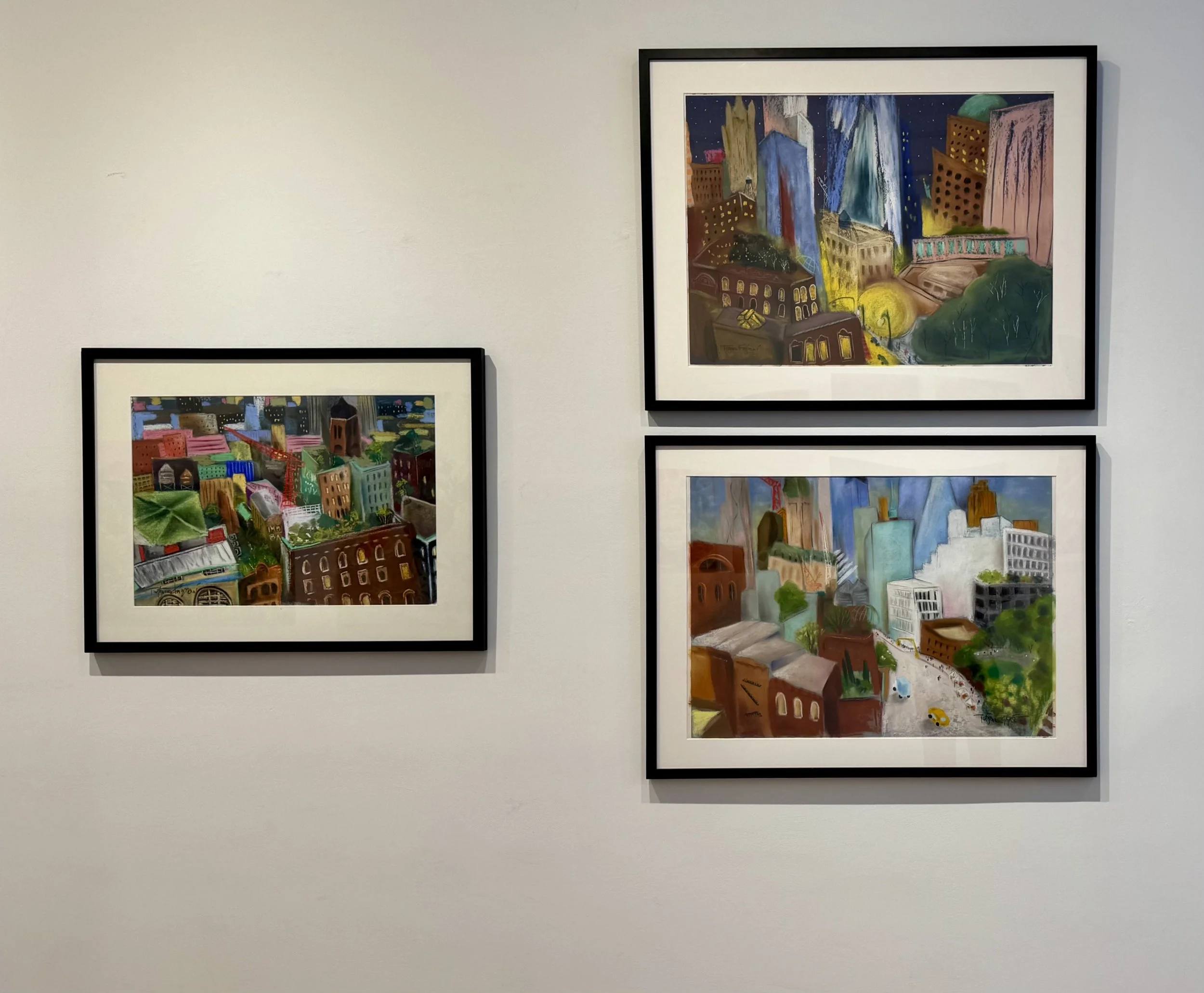 Three Tribecas on the gallery wall.jpg