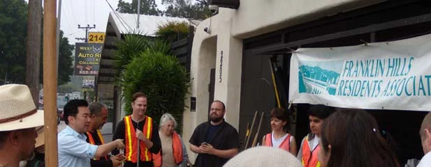 City Councilmember David Ryu (left) joined with about three dozen neighborhood volunteers to clean up Hyperion between Tracy and DeLongpre on Sunday, March 20th.