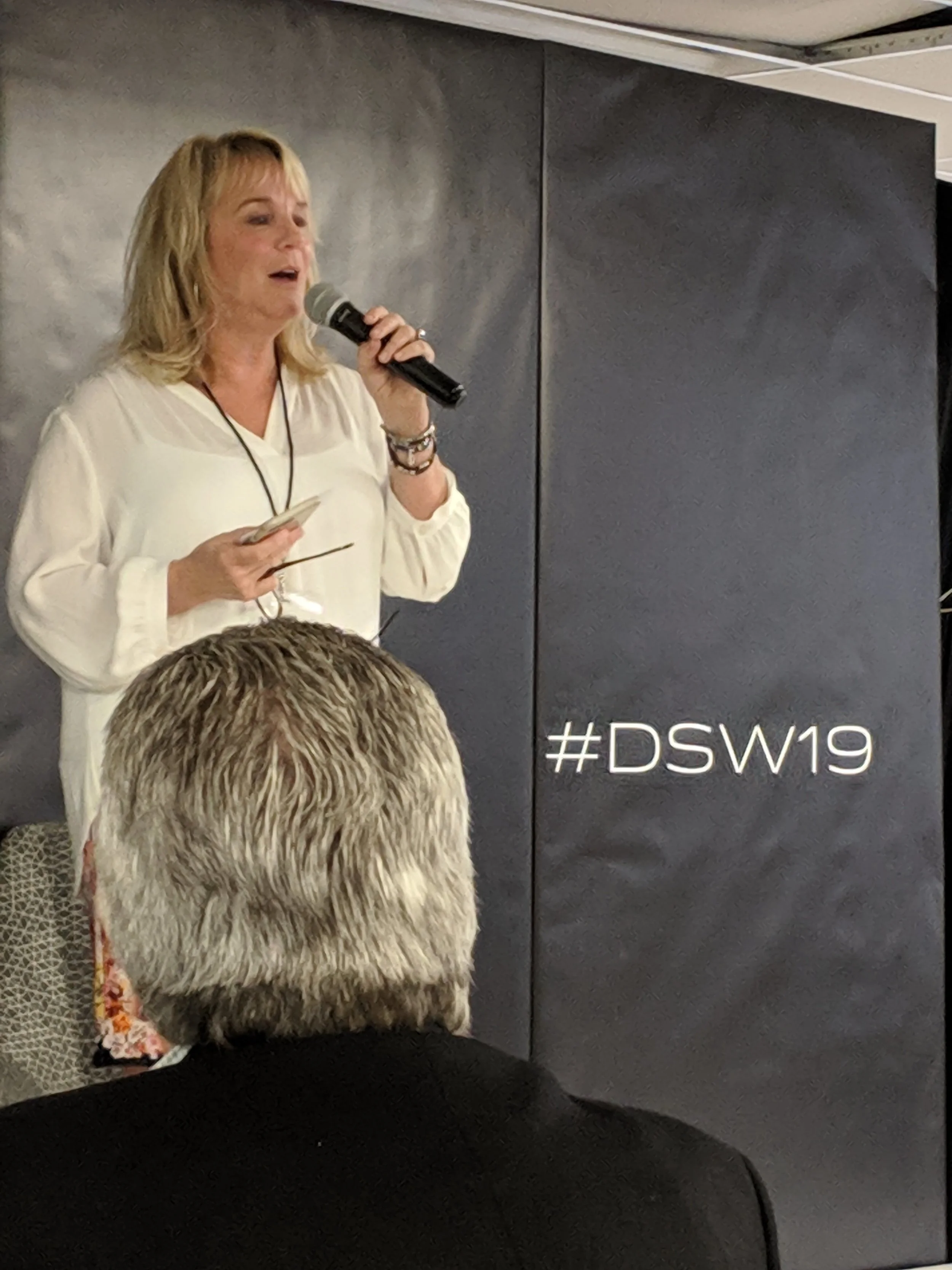 Alyce Alston introduces Craig Hall for the Democratizing Entrepreneurship.