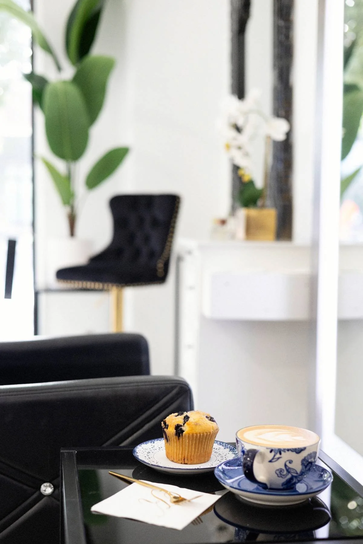 Order coffee and fresh pastries directly to your chair in a luxury salon environment downtown San Antonio