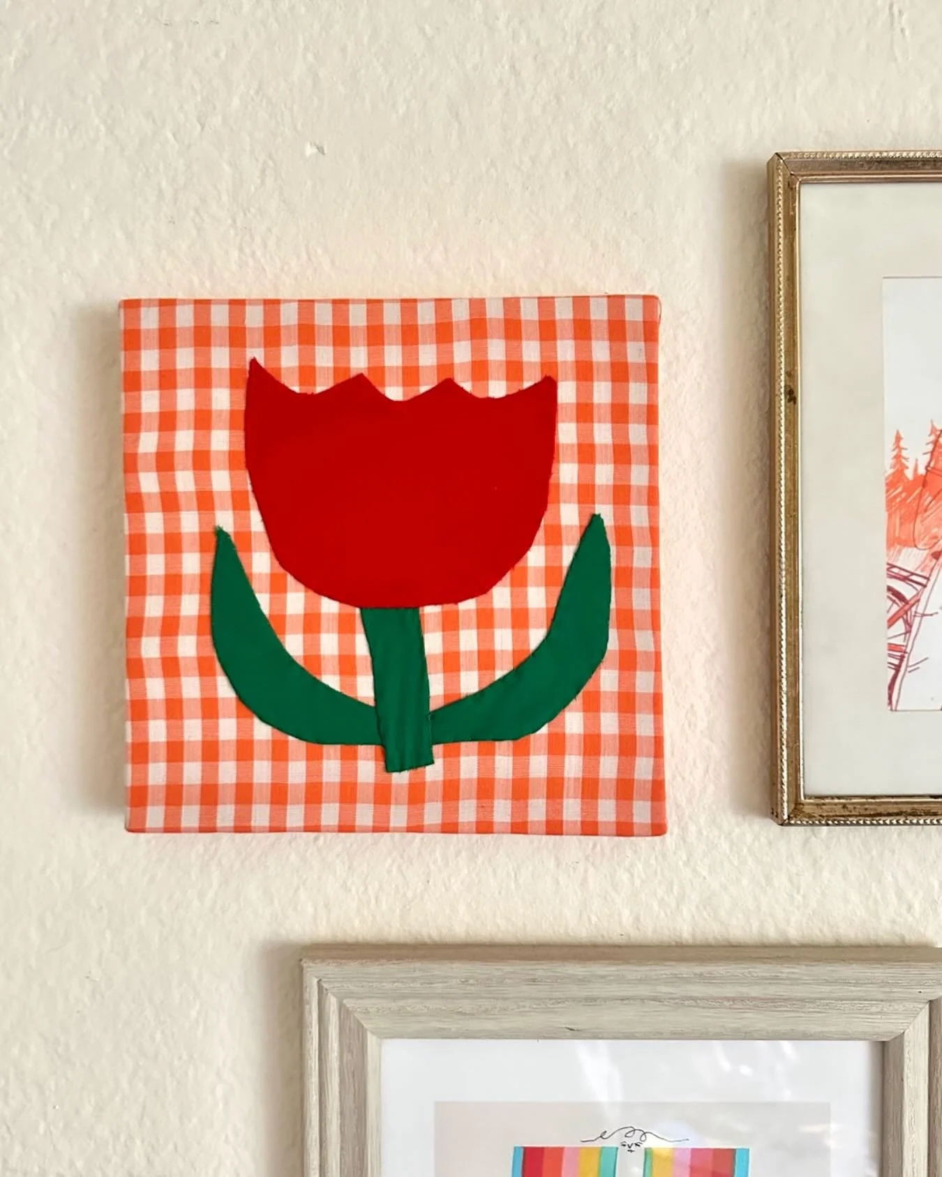 Getting some of my work up on our home walls.