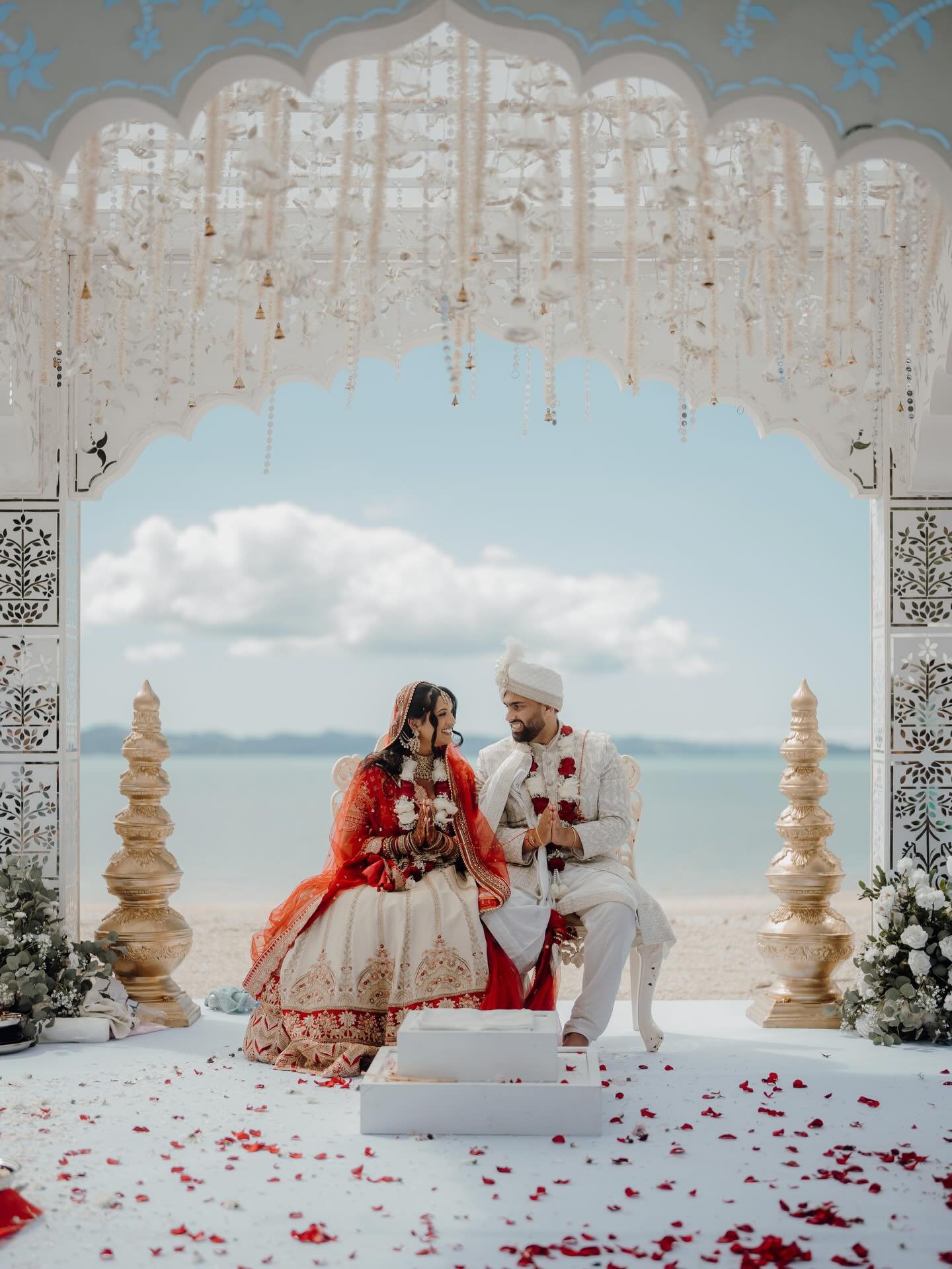 Deevan &amp; Rasmita&rsquo;s dreamy mandap setup at @themccallumresidence 🤍 Beach views, soft light, and the most beautiful details everywhere ✨🌊

#aucklandweddings #indianweddings #gujarat #weddinginspo #love