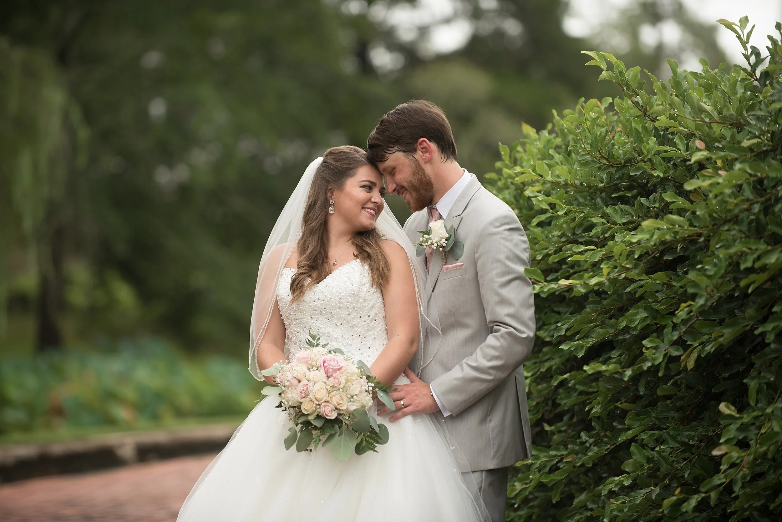 The newlyweds share a tender moment after the wedding ceremony
