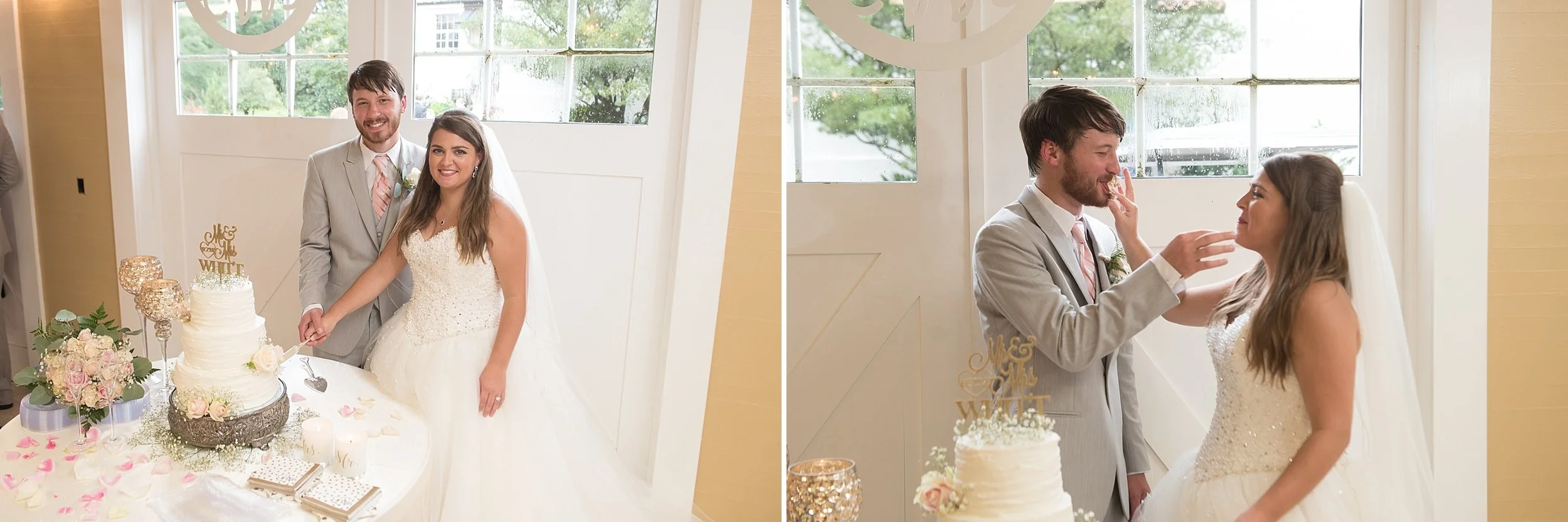 newlyweds cut their three tier white wedding cake
