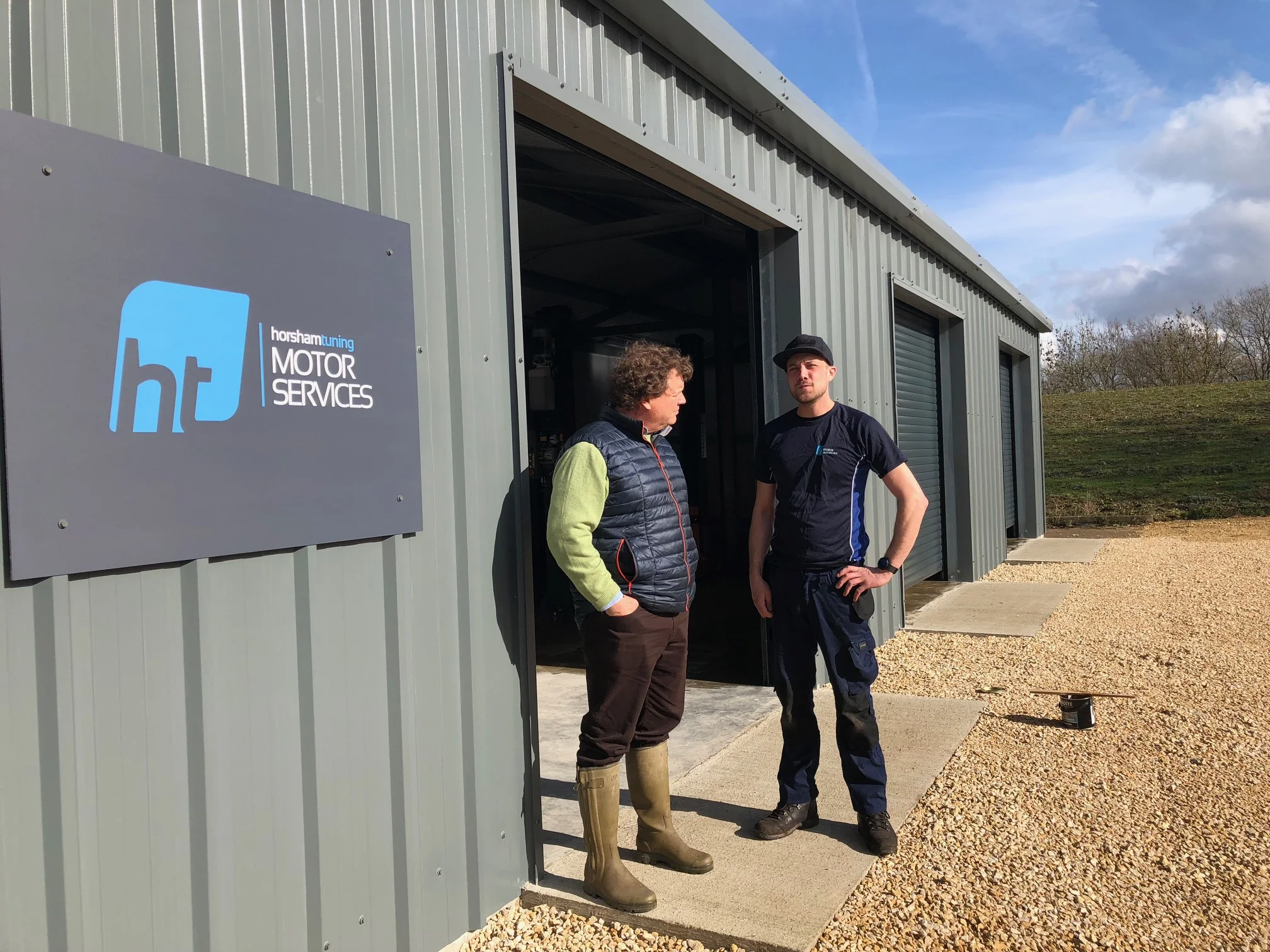 Charlie opening Terry's converted workshop for HT Motors