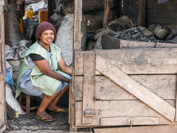 A woman sells charcoal in Antananarivo