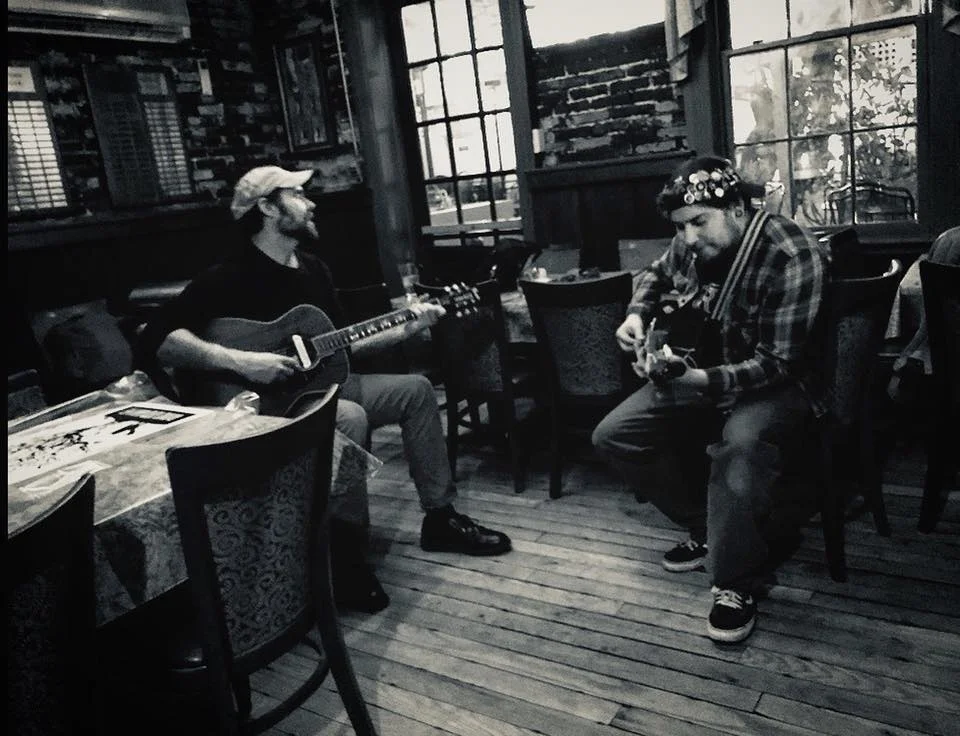 Backroom pickin'. (left) Konrad Wert - Possessed By Paul James • (right) Aaron Yealdhall of skribe • Photo: Cory Streett