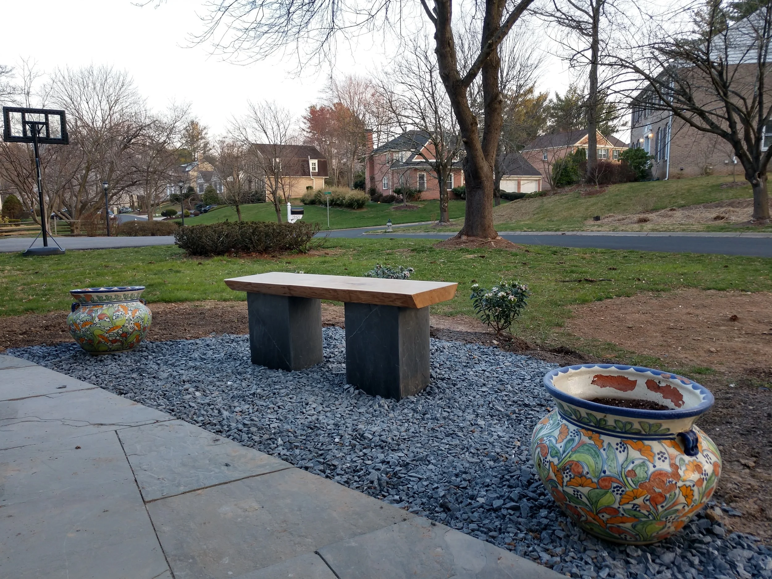   Collaborated with client to build this bench- white oak top on slate pedestal.   