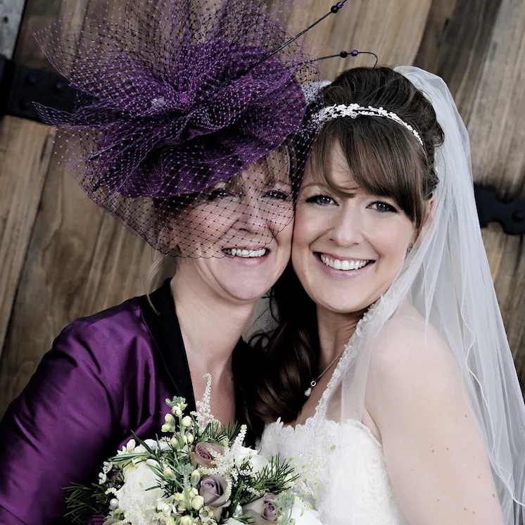 Mrs. Bennett wears 'Bardot' headpiece by Sarah Crozier Photography © Ross Holkham