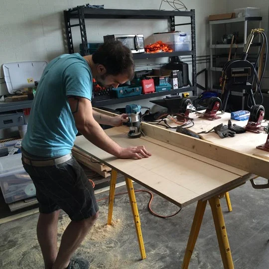 Sanding-a-Wall-for-Set.jpg