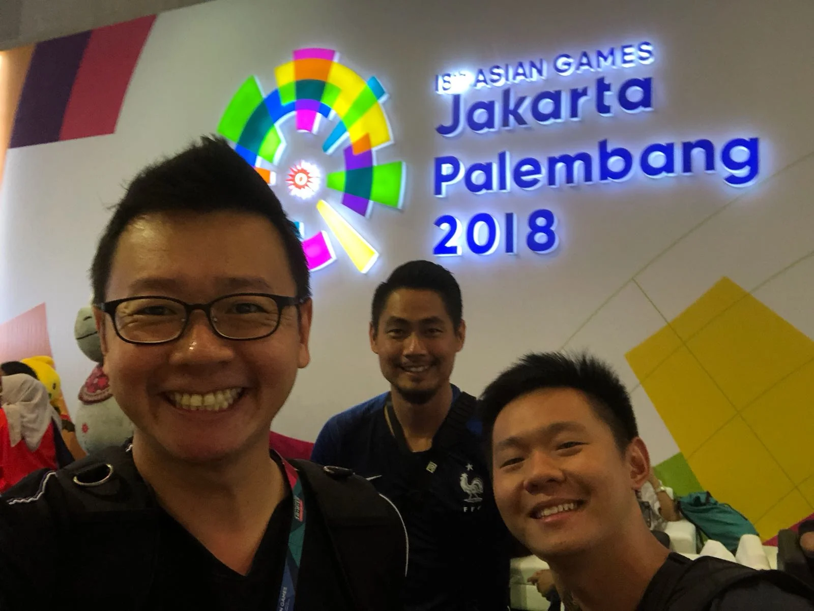 With friends from the local media at the 2018 Asian Games, Jakarta, Indonesia.