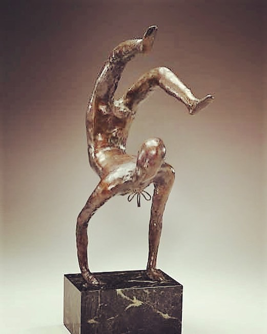The spare, fluid forms of Polish-born sculptor Elie Nadelman (1882-1946) reflect the Modernist philosophy of form over subject matter. Animals, dancers, musicians and circus performers were favored subjects as in &ldquo;Acrobat&rdquo; - The Dial, Jun