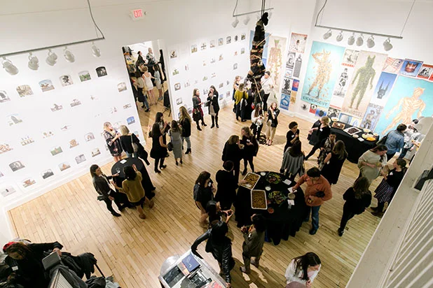 candella gallery hosting welcome party, guests with drinks and snacks