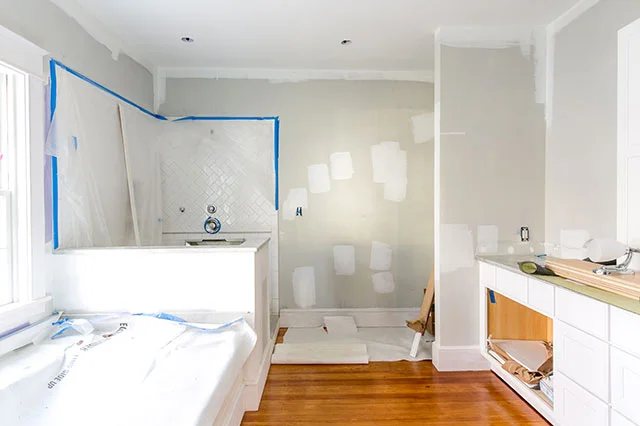 In progress photography of bathroom being gutted - Sarah Der