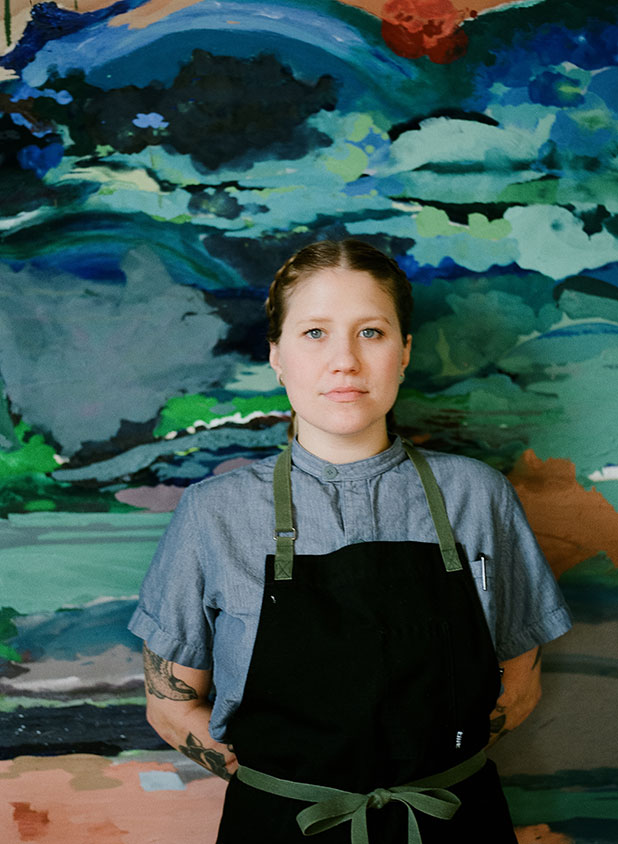 Olivia Wilson, Richmond pastry chef, in front of painting at Chairlift