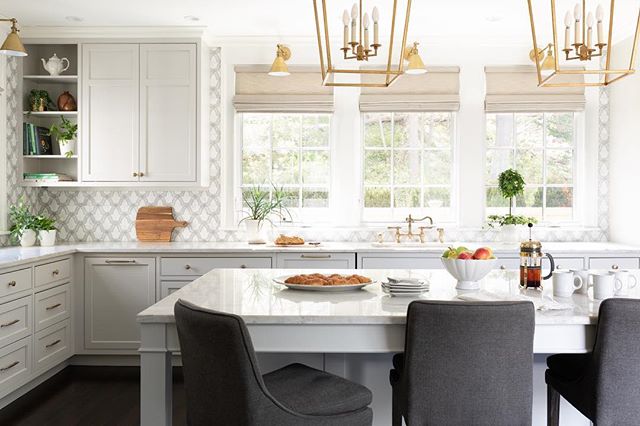 Who wouldn&rsquo;t love to start their day in this kitchen! Neutral tones with gold accents give this room a calm happy feel.  Swipe for before!!! Backsplash: @tilebydesign 
Lighting: @visualcomfortco 
Stools: @arhaus 
Construction : 
@windhillbuilde