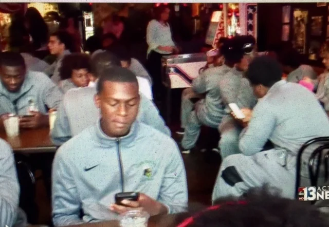 STRANDED MIAMI TEAM EXPERIENCES LAS VEGAS HOSPITALITY (Concerned Miami Central football team members check their mobile phones for word from home after being stranded in Las Vegas by Hurricane Irma).