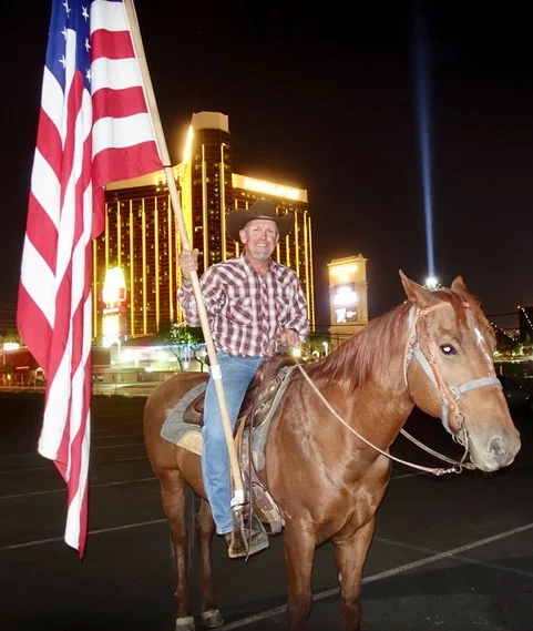 FLAG-BEARING COWBOY PAID HIS RESPECTS WITH 6 1/2-HOUR VIGIL ON STRIP WITH HIS HORSE