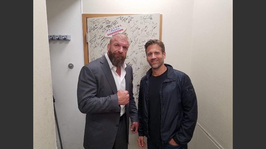 WWE star Triple H with ESPN personality and boxing analyst Max Kellerman at Scotch 80 Prime, adding their signatures to executive chef Barry Dakake’s “Shakedown Room” collection. (Courtesy photo)