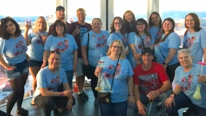 Shanna McPheters, center front row, with her husband, Gary, red shirt, on a High Roller pod with a group marking the 21st birthday of the McPheters’ daughter, Brooke. Photo: Courtesy