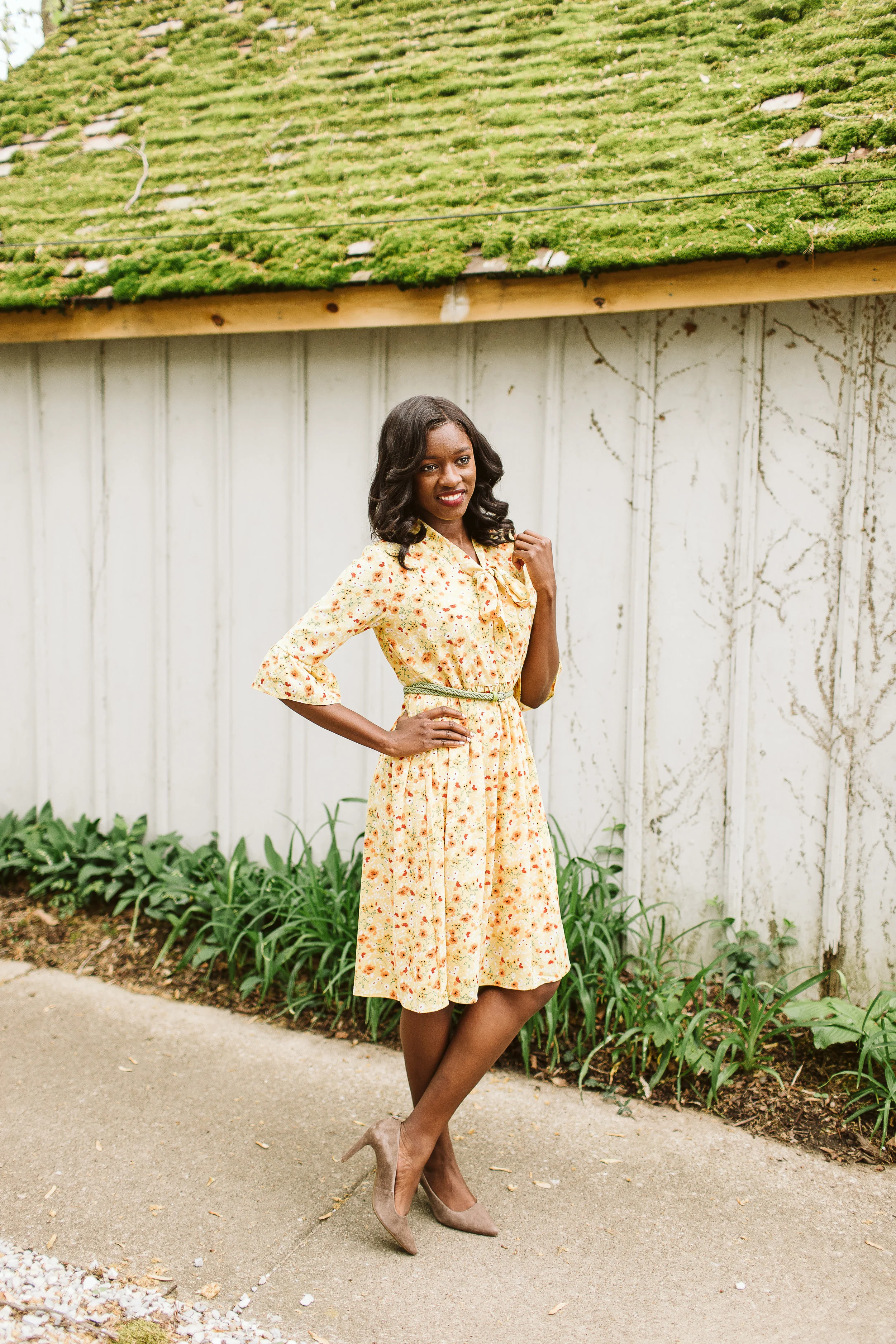 Cherelle wears the Mustard Babydoll Dress . Available at Simple Extravagance for $35.