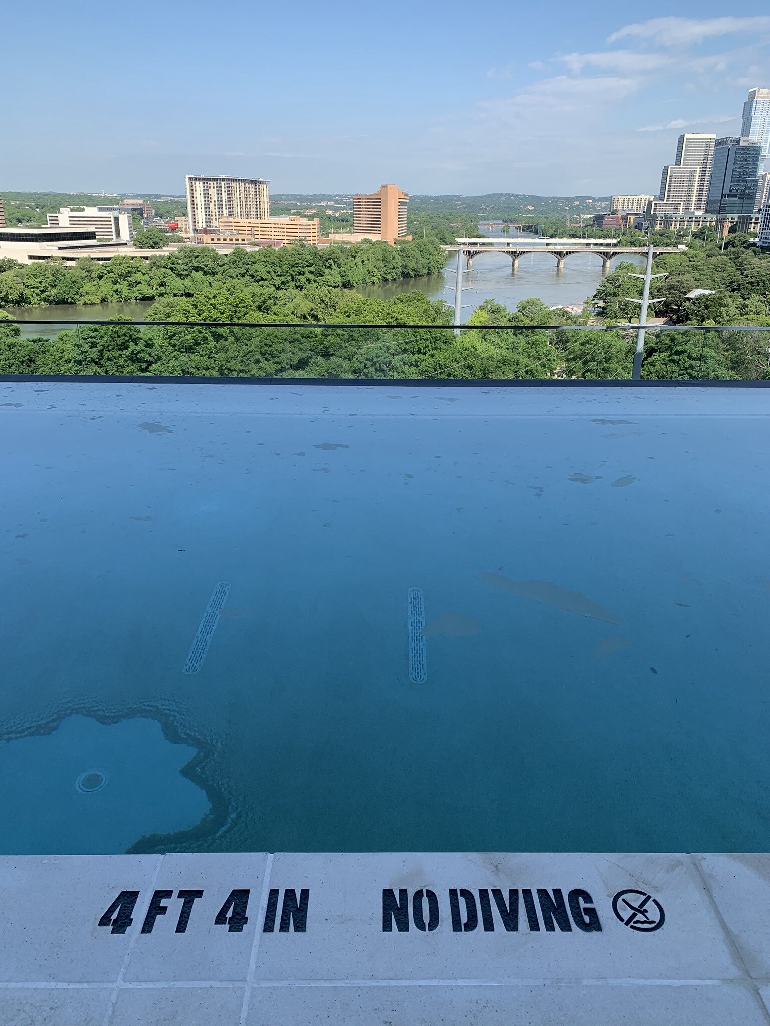 Engraved pool depth markers