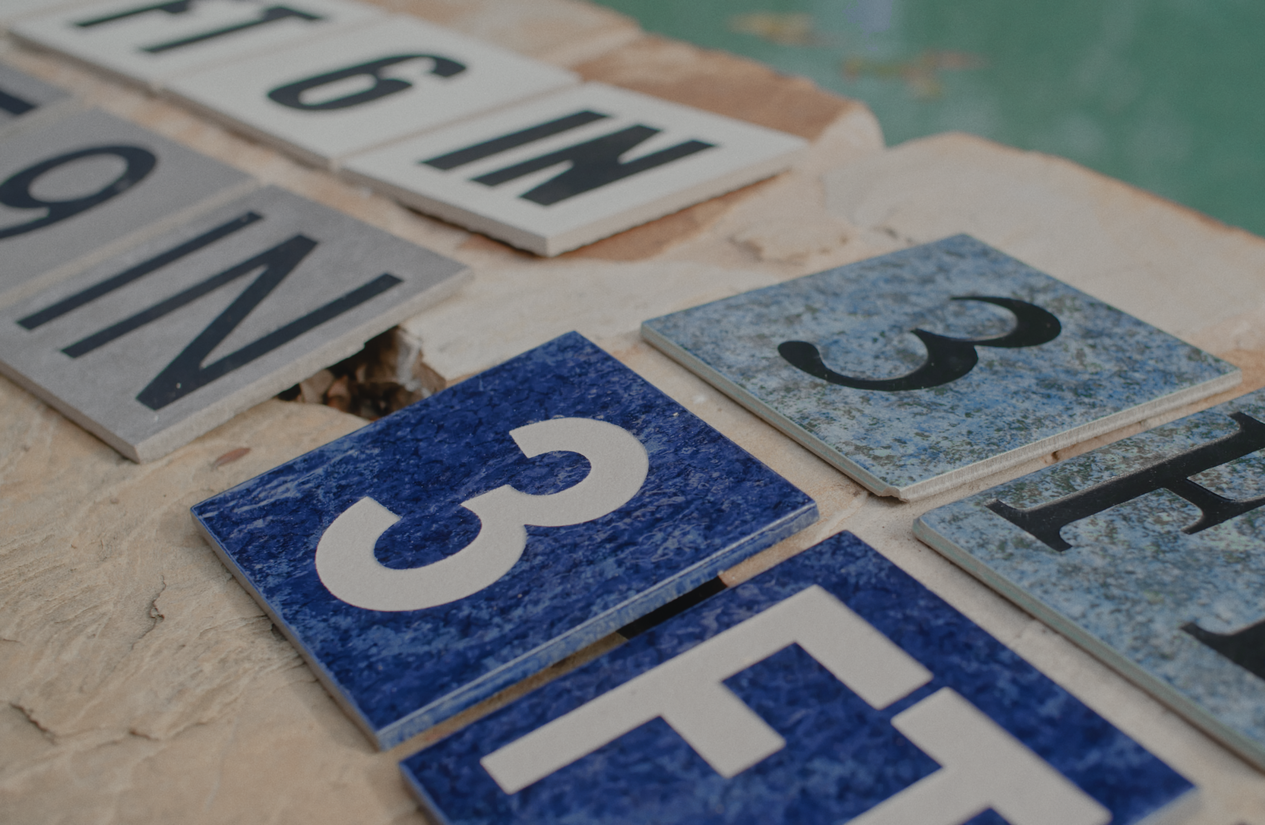 sandblasted depth makers on pool tile