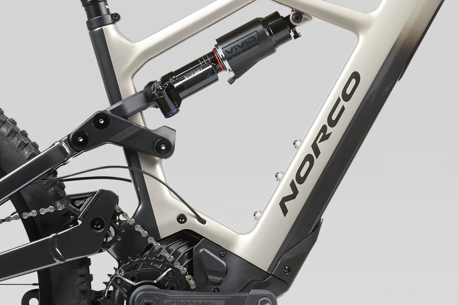 range_vlt_c2_silver_rear_shock_detail_bg-xl.webp