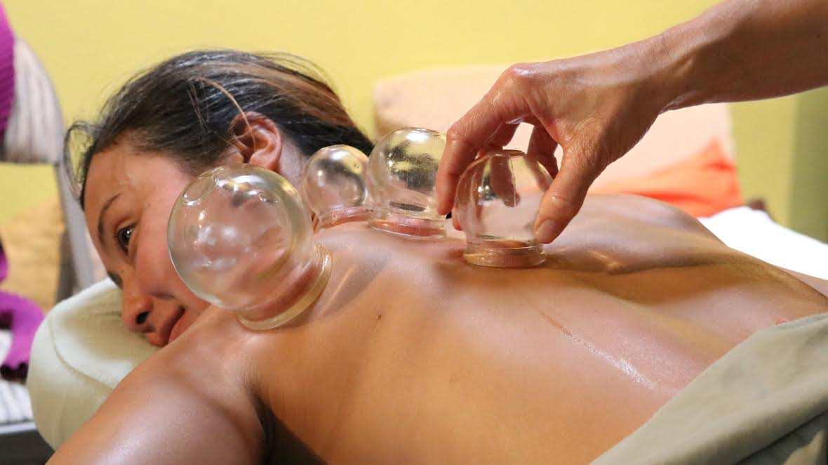 cupping client smile back.png