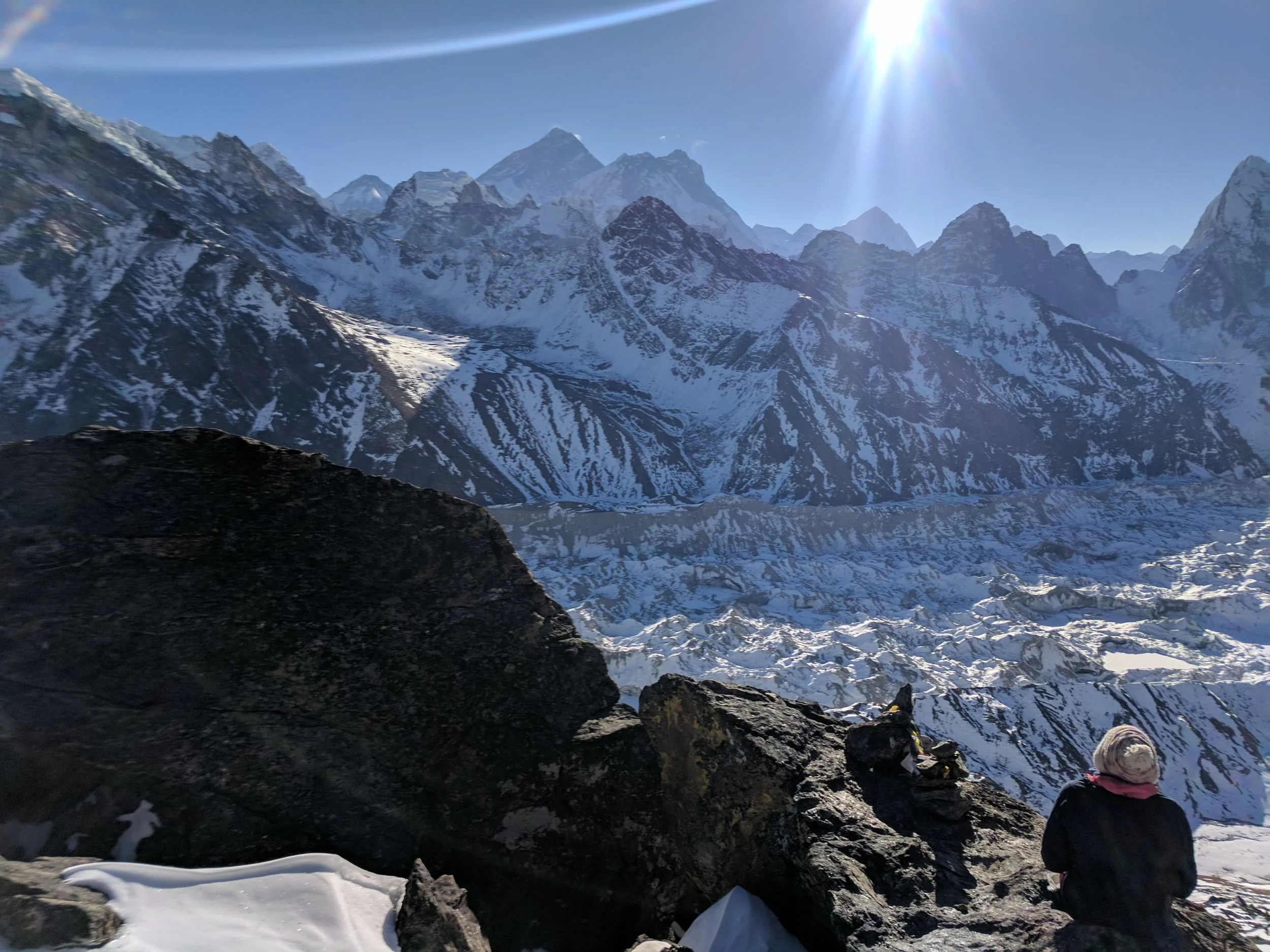 We watched the sun rise over Mt Everest about 300 vertical feet from the top. The snow had covered the trail, so we took a yak path up the mountain. The grueling climb rewarded us with spectacular views.