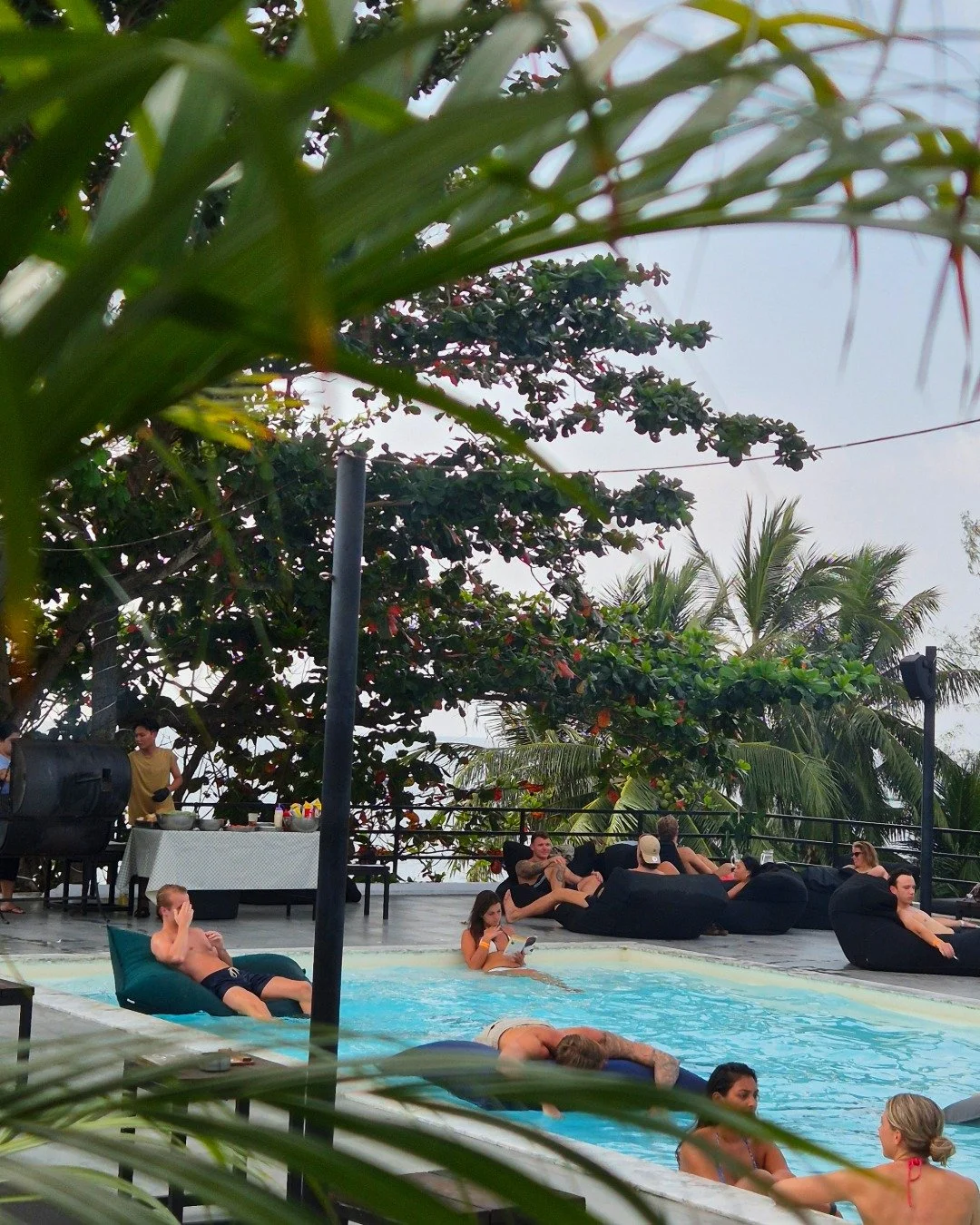 Sunset skies, music in the air and the smell of the grill 🔥

BBQ nights at Savage bring everyone together, guests cooling off in the pool, others grabbing juicy burgers, drinks in hand and a live DJ setting the tone as the light fades over Koh Tao ?