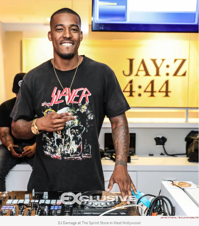 DJ Damage at The Sprint Store in West Hollywood- photo credit: Jarrod Williams/Exclusive-Access.net | Source: https://revolt.tv/stories/2017/07/02/jay-drops-444-invites-public-thier-local-sprint-store-preview-07004c07cd Note: I do not own the rights to this image, if you re-post, please cite properly.