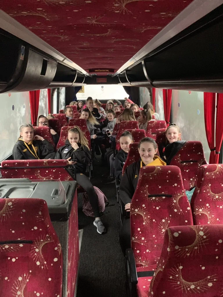 Girls all on the bus ready for a fun filled day down @USWRugby for WRU's #RookieRugby event. They can't wait. #girlscan #rugbyforall