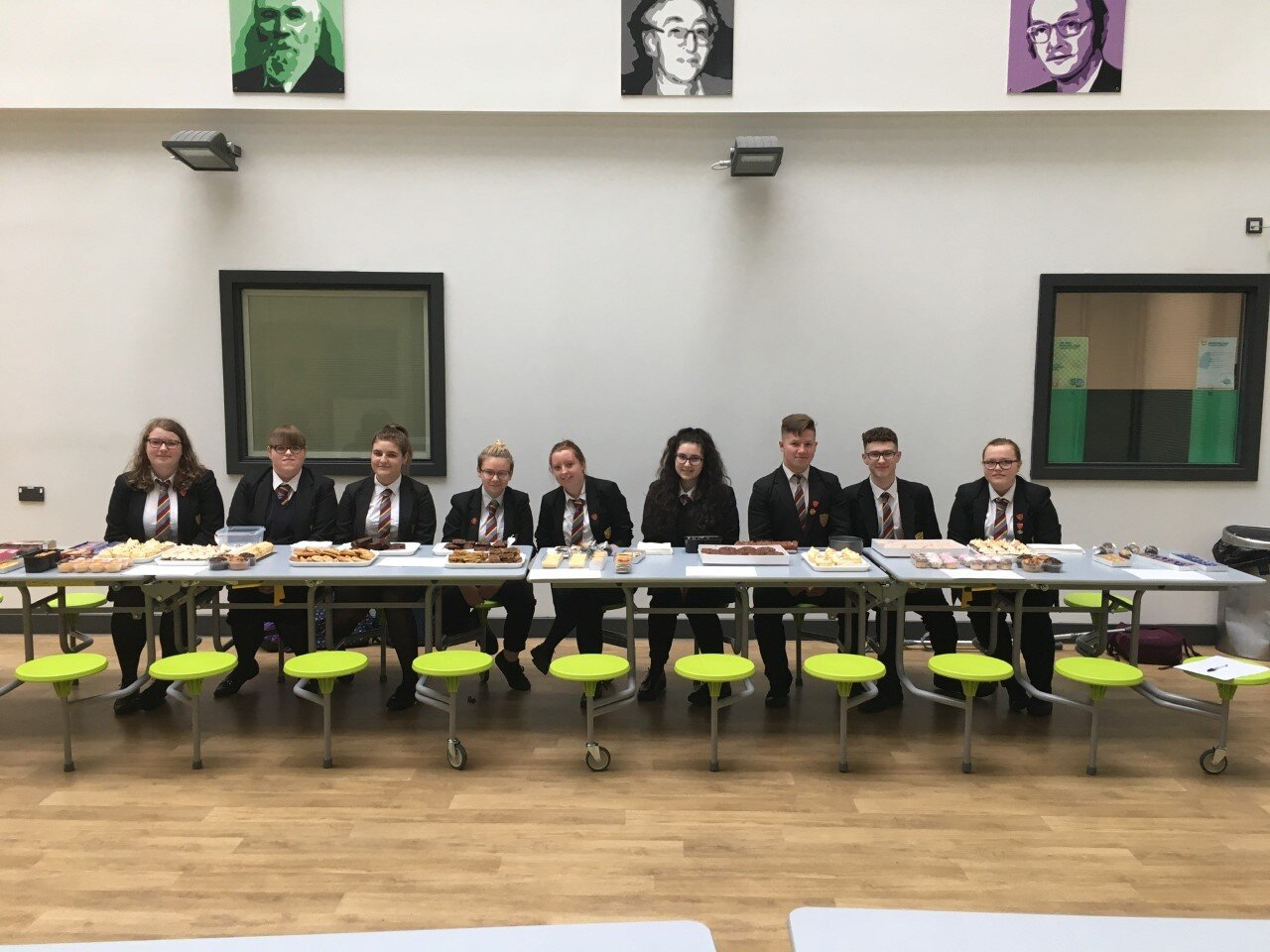 The senior prefect team selling cakes, biscuits, and doughnuts in support of Macmillan Coffee Morning 2019, they raised £135 in total. Da Iawn! #StriveBelieveAchieve