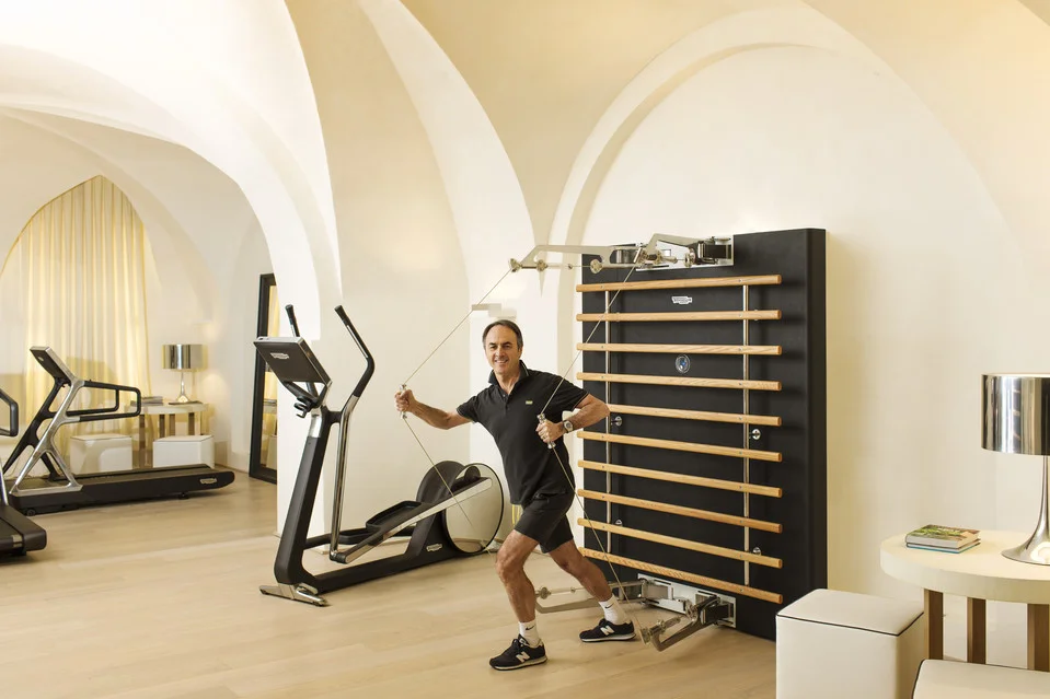 Nerio Alessandri's gym at his home in Cesena, Italy. He wants his home gym to be a place where family and friends enjoy hanging out together. PHOTO: MARCO ONOFRI FOR THE WALL STREET JOURNA