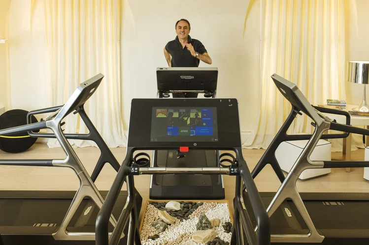 For those with limited space at home for a gym, Mr. Alessandri still recommends putting a piece or two—perhaps a foldable treadmill, elliptical trainer or a station attached to the wall with ropes or straps and handles—in a room where you like spending time. PHOTO: MARCO ONOFRI FOR THE WALL STREET JOURNAL