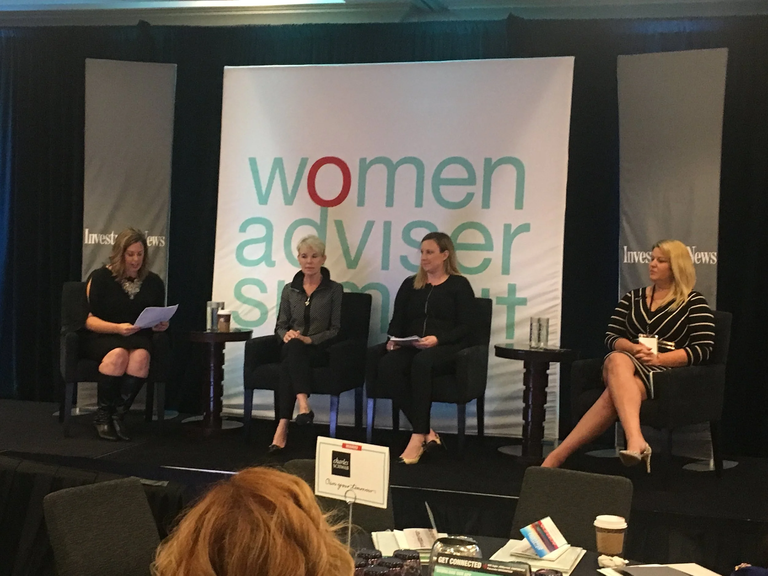 Cofounder of The W Source™ Hannah Buschbom (center right) discussing business growth strategies with Theresa Gralinski (left), Joni Youngwirth (center left) and Kristi Straw (right) at the InvestmentNews Women Adviser Summit in San Francisco, CA.