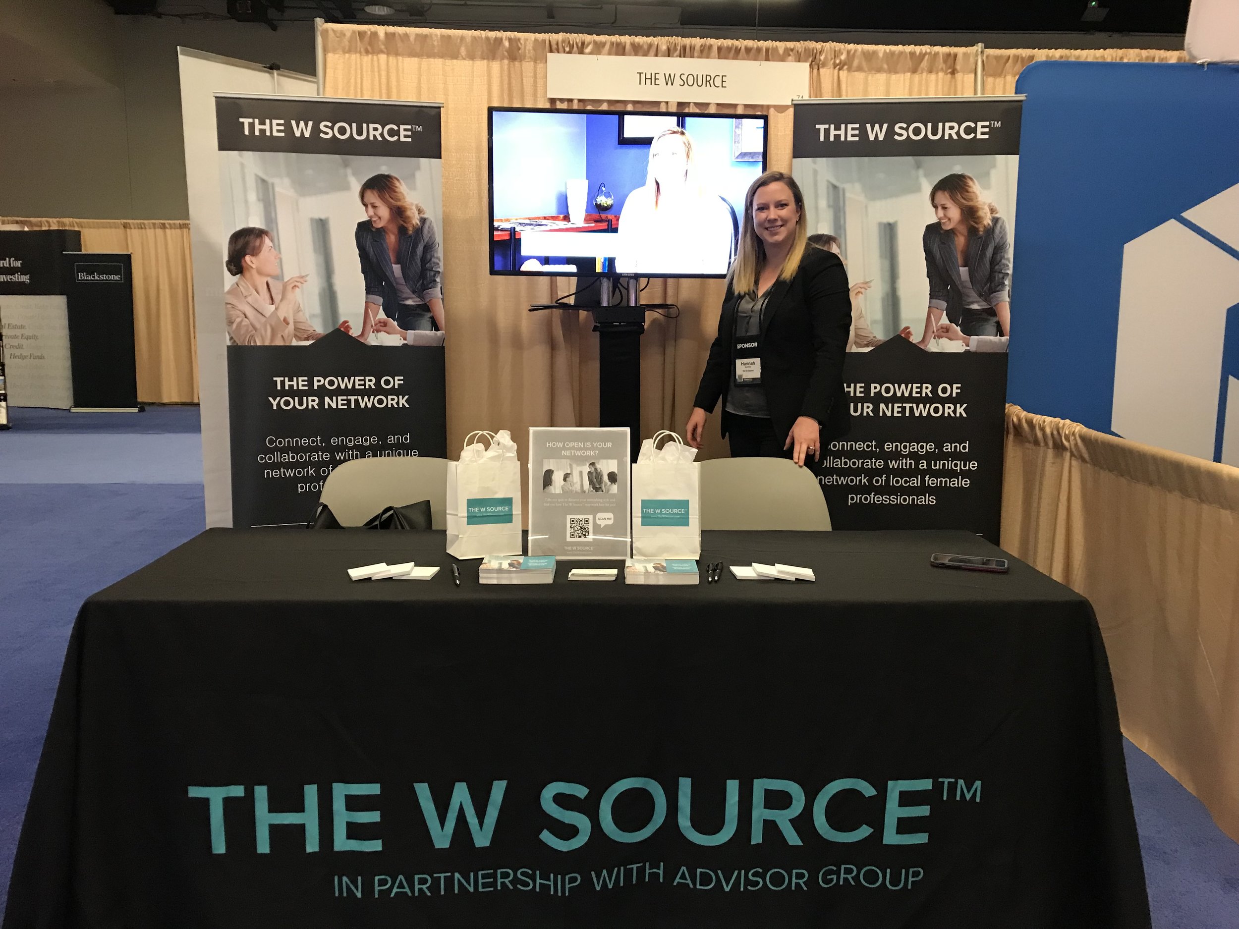  Cofounder of The W Source™ at The W Source™ booth ready to greet Advisor Group ConnectEd attendees. 