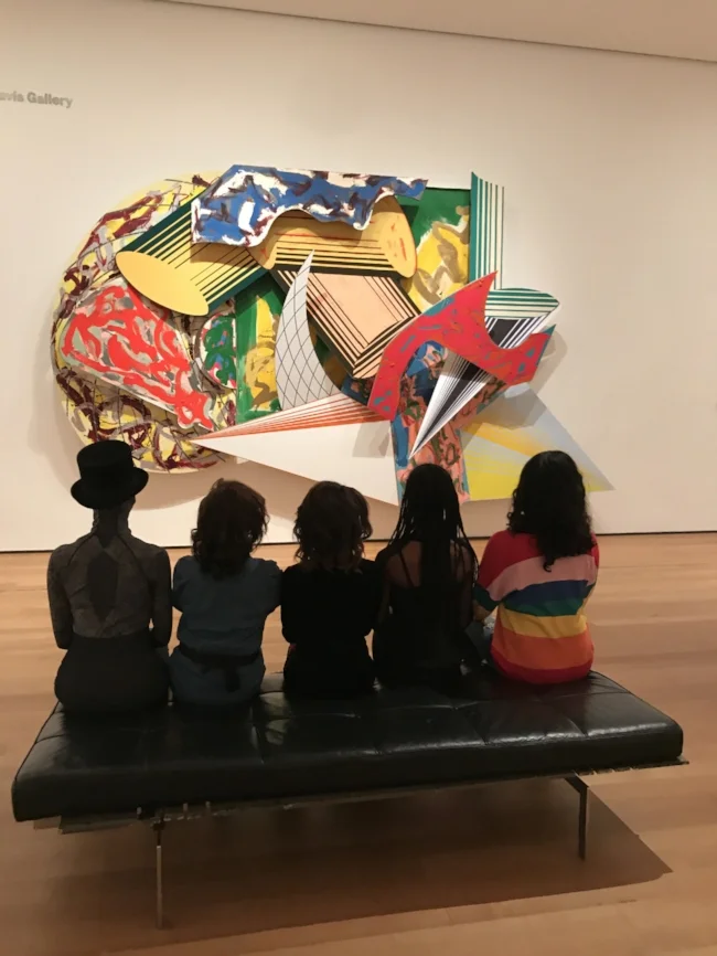 Layla (first from left) and club members of Kids Opera & Art Posse at the Museum of Modern Art