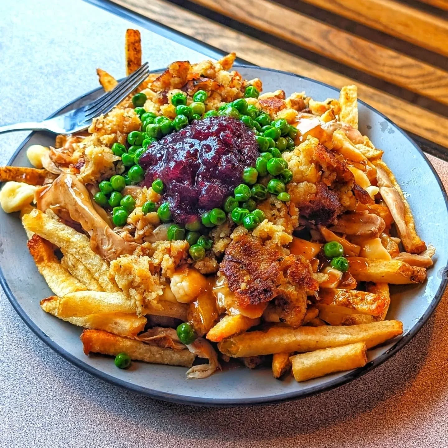.
🐓🌲🐓🌲🐓🌲🐓🌲🐓🌲
🌲THE HOLIDAY POUTINE🐓
🐓🔥🐓🌲🐓🌲🐓🌲🐓🌲

FRIES, CHEESE CURDS
GRAVY, PULLED CHKN
STUFFING, GREEN PEAS
CRANBERRY