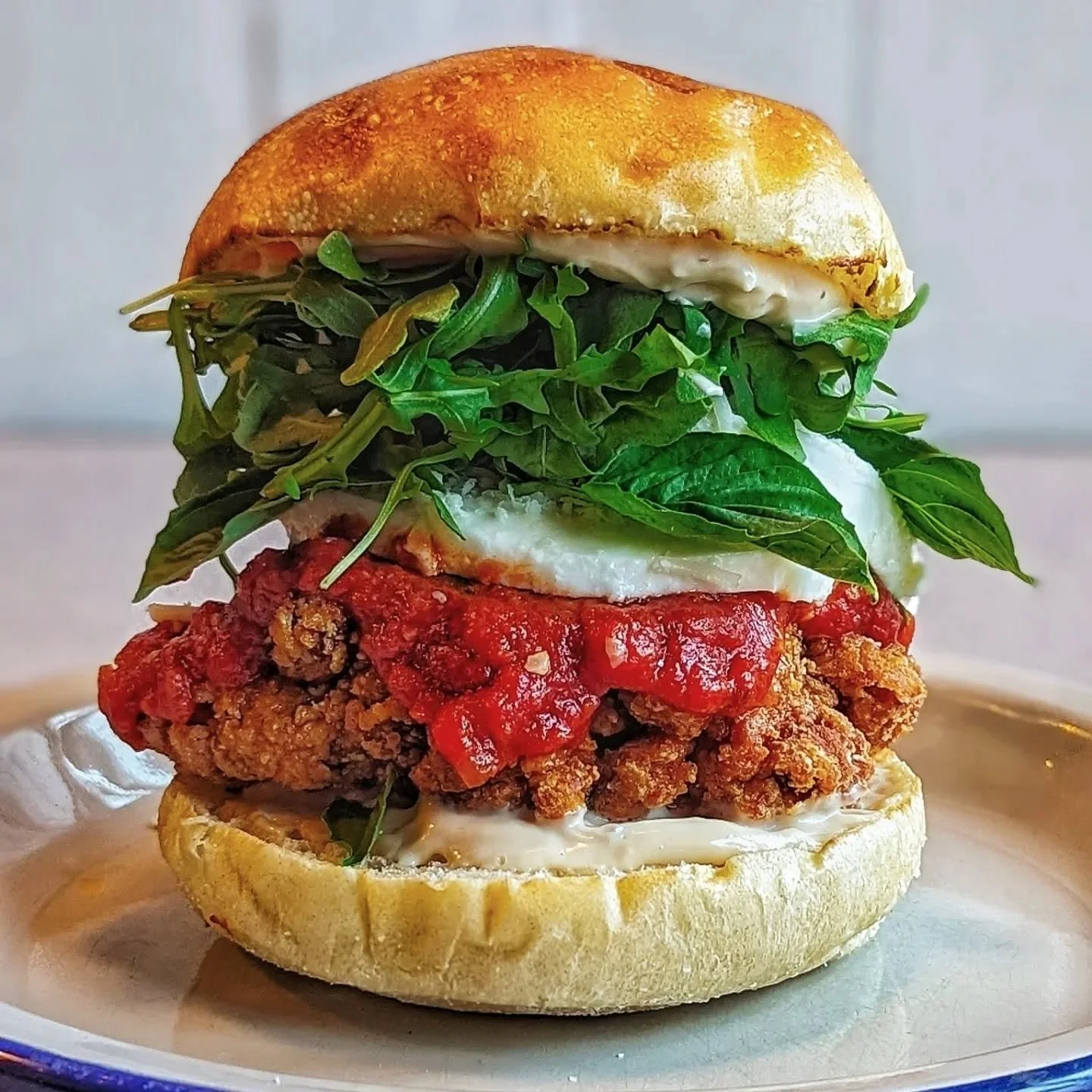 THE CHKN PARM

FRIED CHKN 🐔 
TOMATO SAUCE 🍅 
FRESH MOZZARELLA 🧀
ARUGULA, BASIL🍃
PARMESAN 🧀
ROASTED GARLIC AIOLI 🧄

Available Jan 13 - 17 
(we will be closed this Sunday for our staff party)